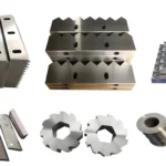 Variety of industrial cutting blades and tools.