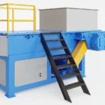 A heavy-duty single-shaft shredder featuring a fixed hopper, an access platform with yellow safety railings, and a powerful direct-drive gearbox.
