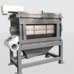 Industrial centrifugal dryer used for removing moisture or liquids from materials, featuring a high-speed rotating drum and durable metal construction