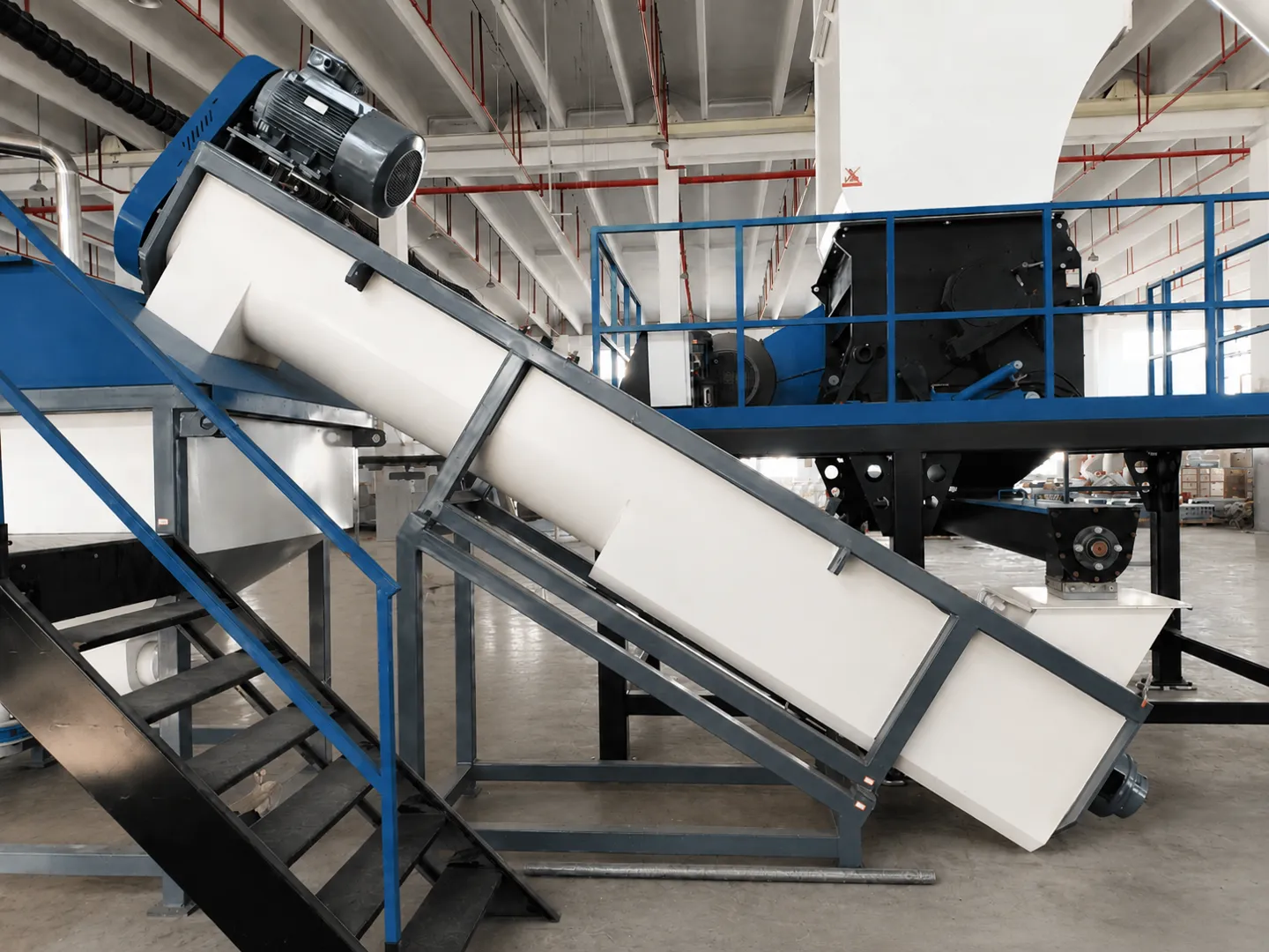 Plastic recycling screw conveyor installation — South America