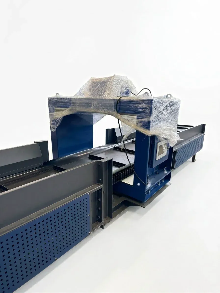 Side view of belt conveyor metal detector installed on recycling conveyor line
