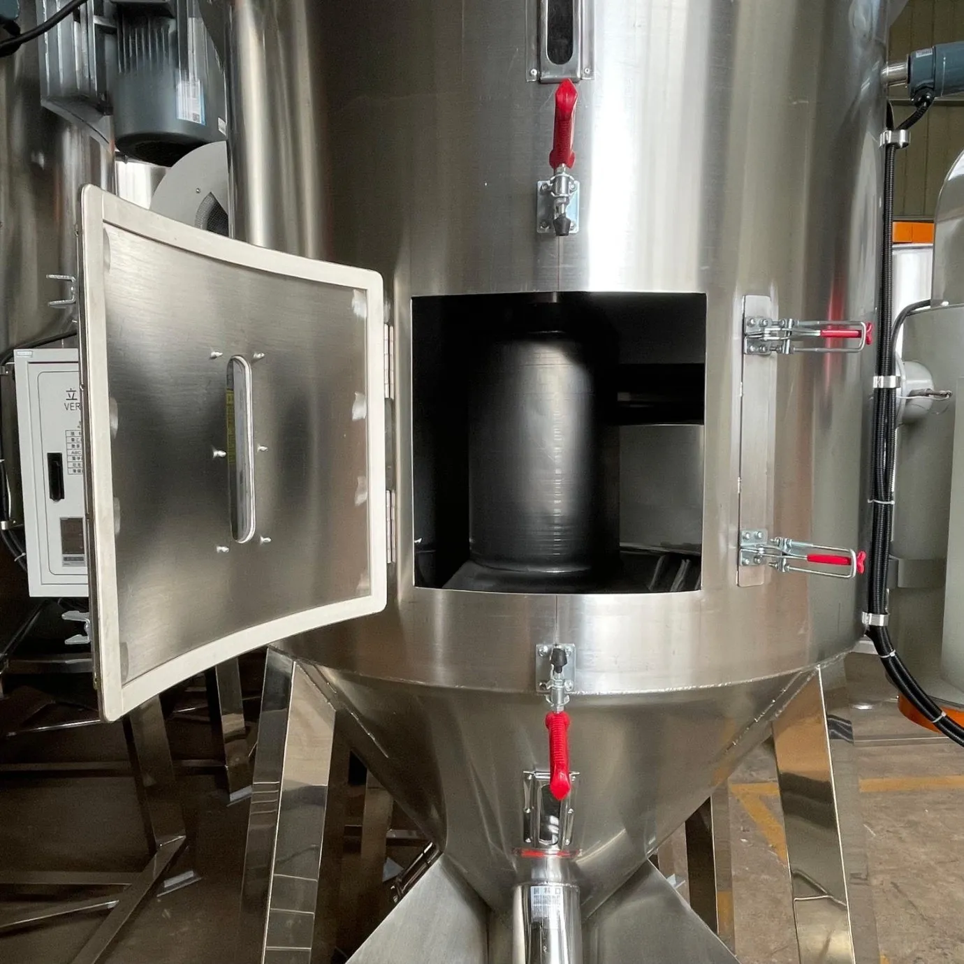Interior mixing chamber of an industrial vertical mixing dryer