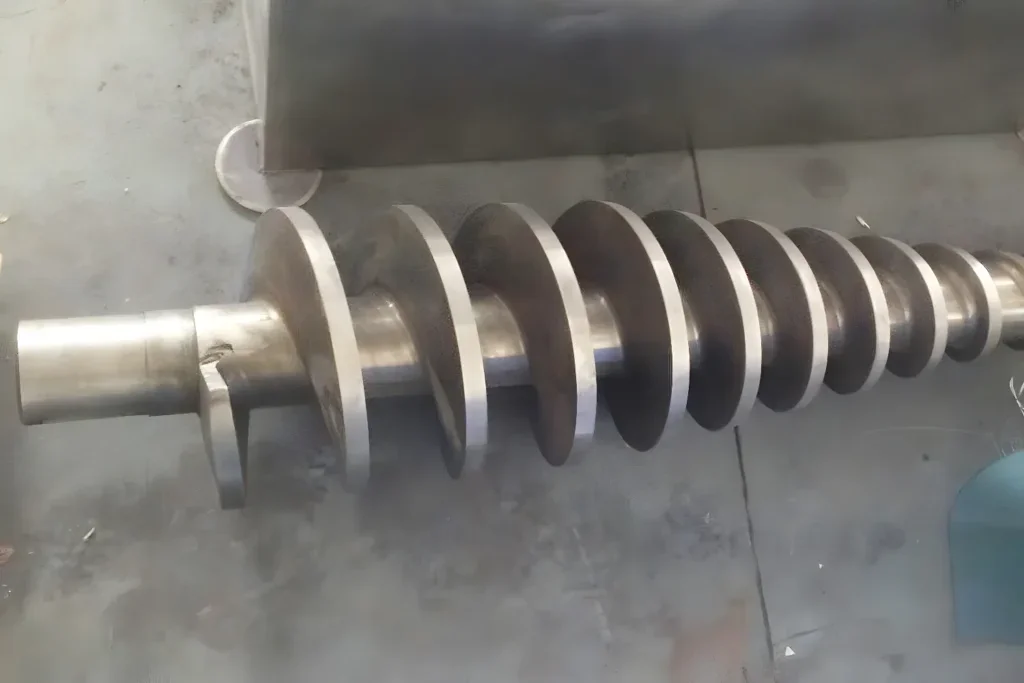 Heavy-duty screw shaft component of a screw press dewatering system